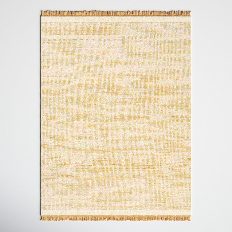Cierra Solid Color Hand Braided Wool Area Rug in Light Beige