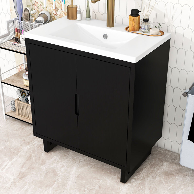 Meuble-lavabo simple autoportant minimaliste avec portes à fermeture en douceur, lavabo en résine et rangement