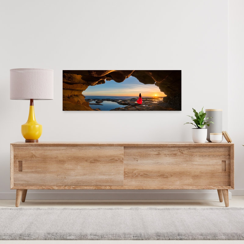 Woman Red Dress Cave Sunset by Jingshu Zhu - Wrapped Canvas Panoramic Print, 30.48 cm H x 91.44 cm W