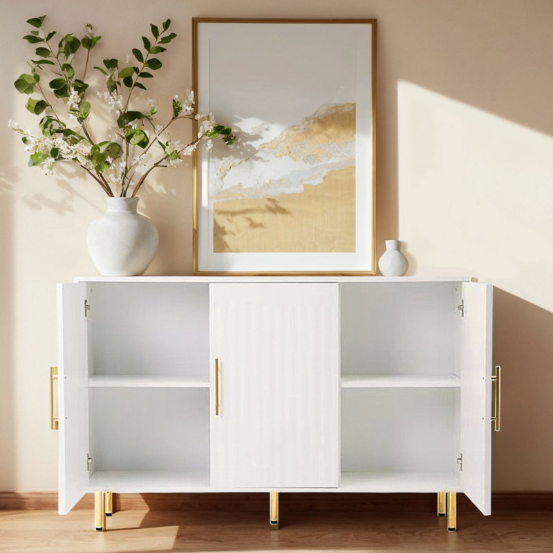 53.7" W White Buffet Cabinet. 3 Doors With Gold Handles. For Various Rooms. Fluted Door Appeal 3-Door Cabinet In White. Handles And Doors. Ideal For Styles. Fits Living, Dining, Kitchen