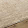Alonzo Solid Color Machine Woven Polyester Area Rug in Beige
