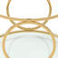 Table basse sculpturale moderne avec structure circulaire en métal