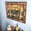 Sculpture murale rustique en bois brun brillant représentant un orignal dans une forêt de bouleaux, avec cadre en écorce, 93 cm de large