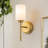 Transitional Victorian Style Wall Sconce with Frosted Glass