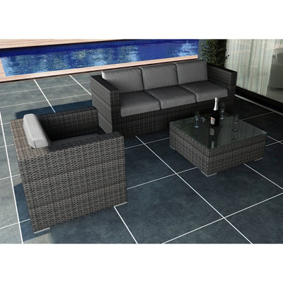 Suffern Premium All-Weather Wicker 4 - Person Patio Conversation Set with Cushions