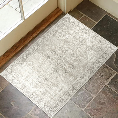 Tapis bleu Samiur Lyle