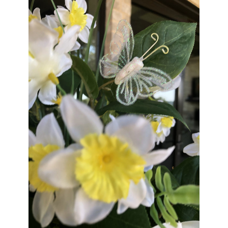 Arrangement floral en vase jonquille