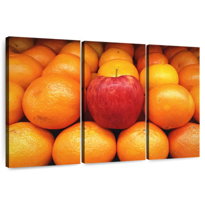 Pomme Yarlin parmi les oranges