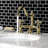 Kingston Brass Restoration Two-Handle 3-Hole Deck Mount Bridge Bathroom Faucet with Brass Pop-Up-11177303