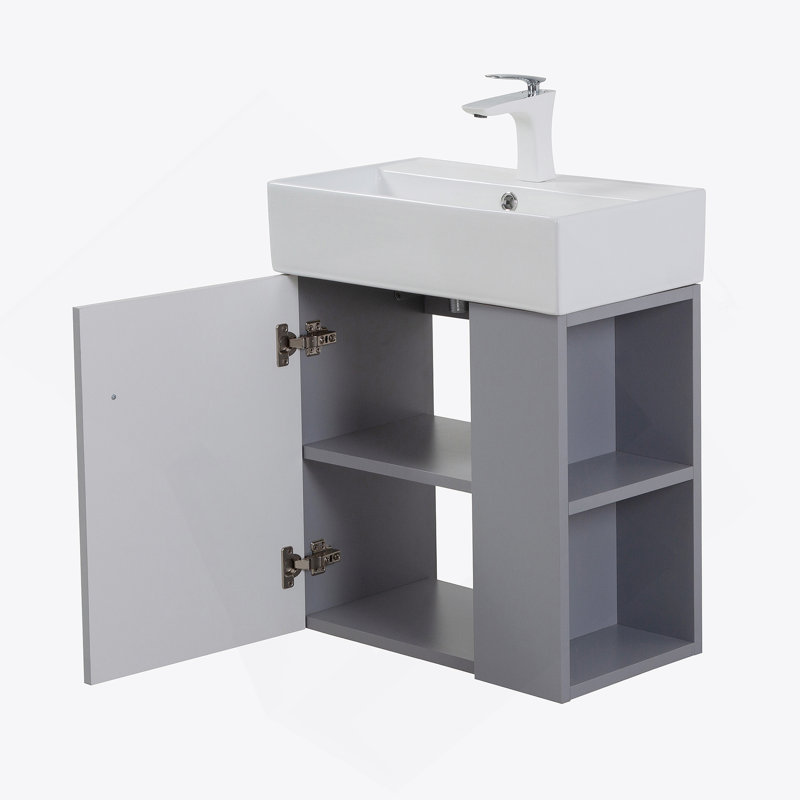 Meuble-lavabo mural de 21,6 pouces avec lavabo en céramique, porte à fermeture en douceur et tablette de rangement flottante pour les salles de bain modernes.