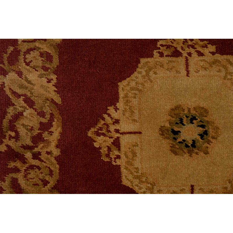 Tapis rouge et or de haute qualité noué à la main