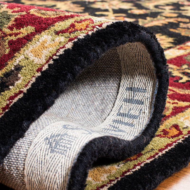 Tapis oriental en laine noir, rouge, vert et or fabriqué et touffeté à la main Cranmore, Ovale 7 pi 6 po x 9 pi 6 po