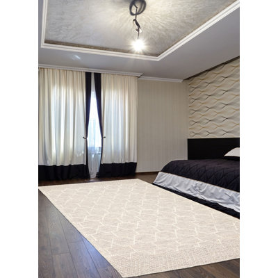 Tapis rectangulaire nouvel âge en laine Hatsue de conception unique 5 pi x 8 pi crème