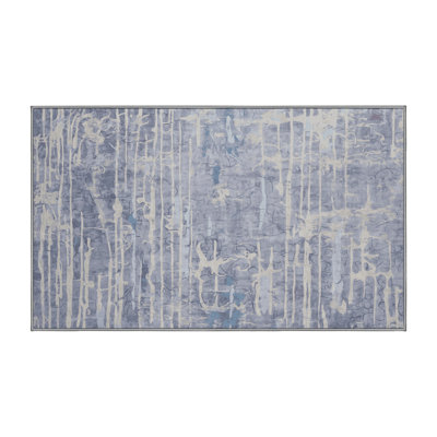 Tapis gris lavable à la machine