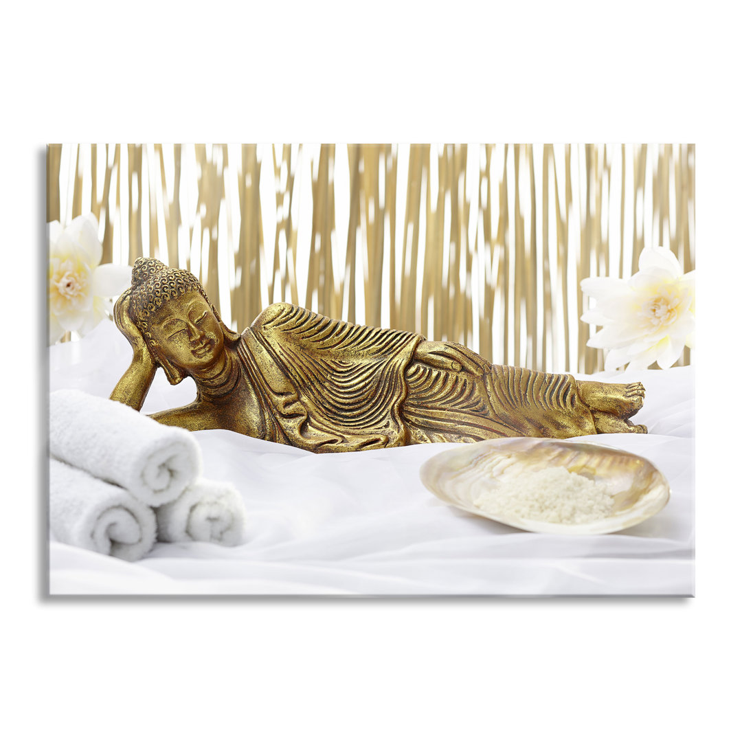 Glasbild Golden Buddha on Towel