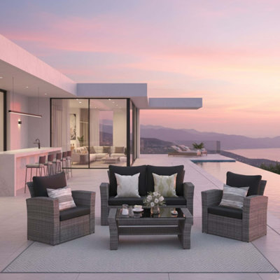 4-Piece Wicker Patio Conversation Set With Glass Table And Cushions