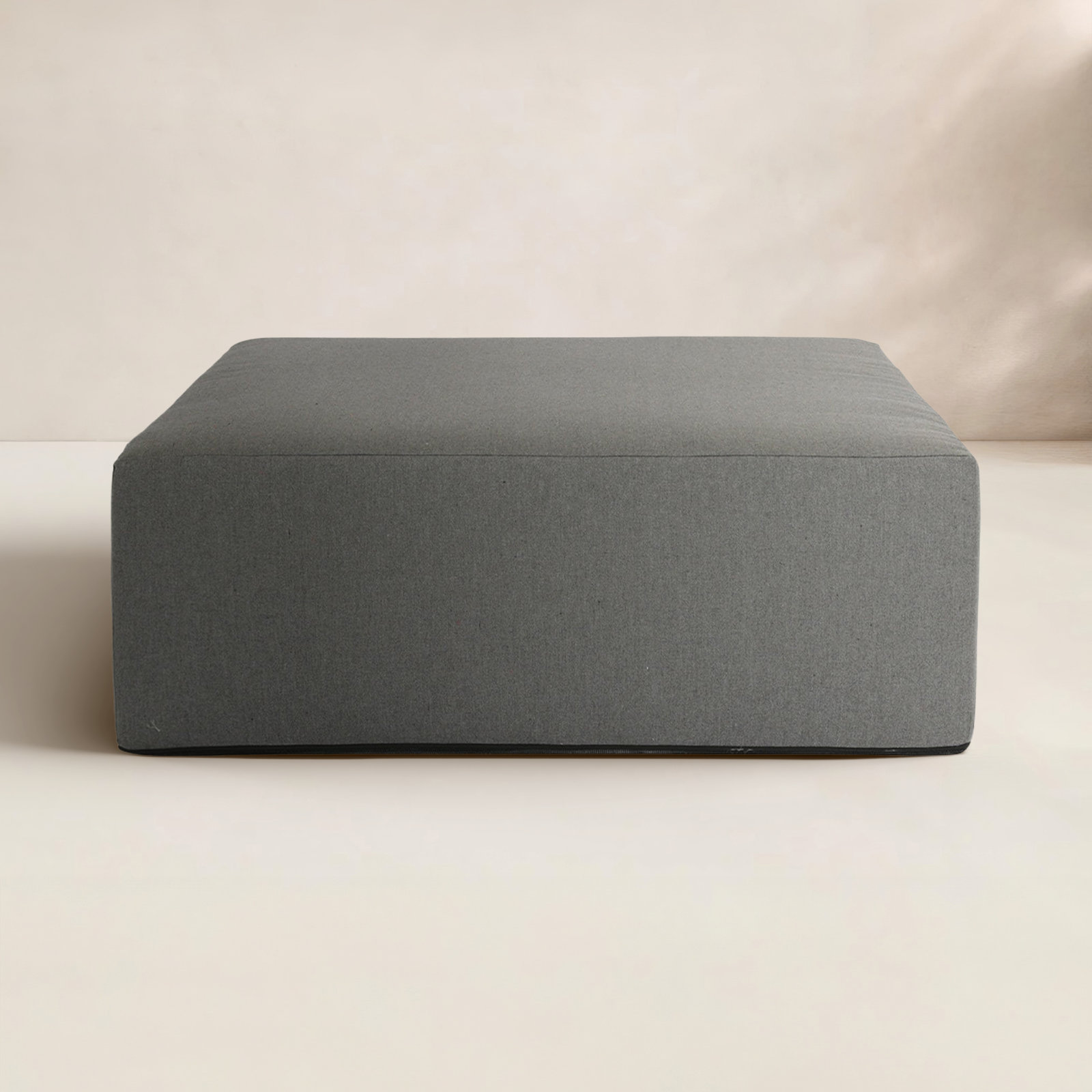 Hania Upholstered Outdoor Ottoman with Sunbrella® Cushion