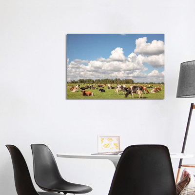 Grazing Cows In A Meadow by Clara Bastian - Wrapped Canvas Print
