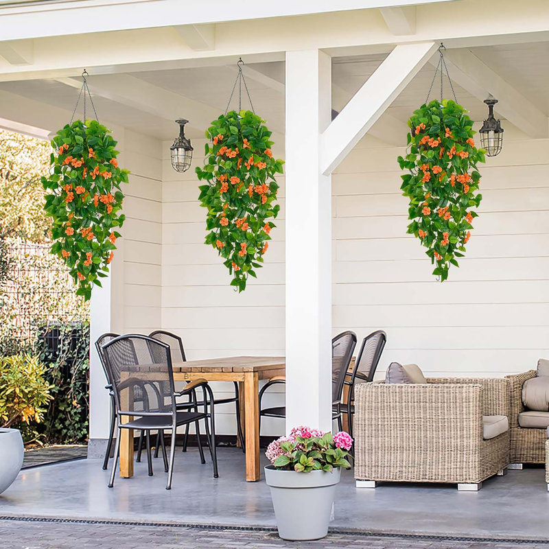 2 plantes suspendues artificielles, fausses plantes suspendues vignes Pothos avec fleurs oranges pour un décor intérieur et extérieur (sans paniers)