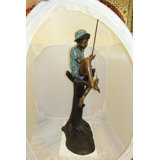 Boy Sitting on a Tree and Fishing Bronze Statue -  Size: 34"L x 28"W x 64"H. 