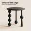 Table de bout ronde moderne en bois d'hévéa noir avec pieds sculpturaux