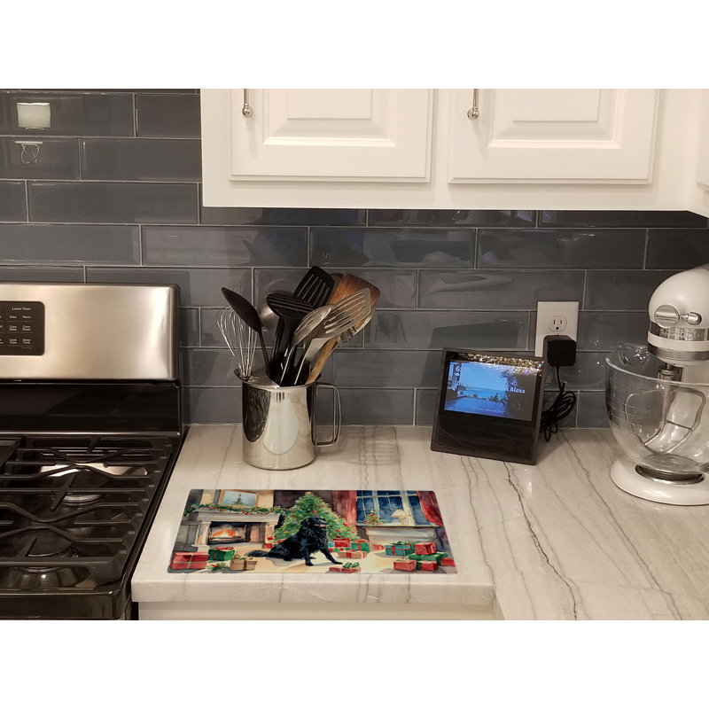 Flat-Coated Retriever Cozy Christmas Glass Cutting Board Large