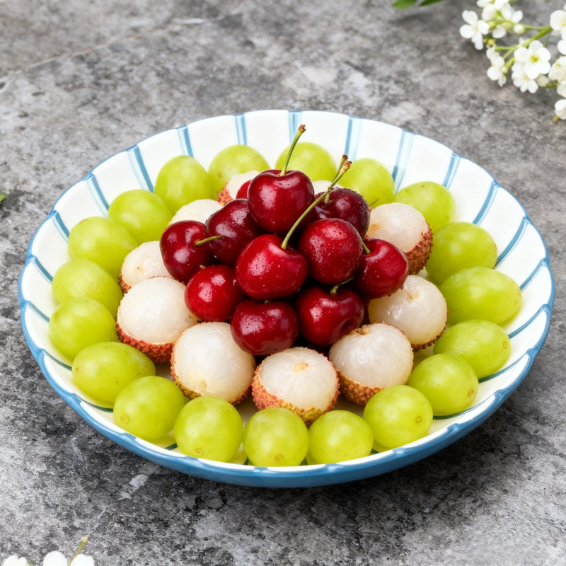 Blue petal-shaped fruit bowl with stand