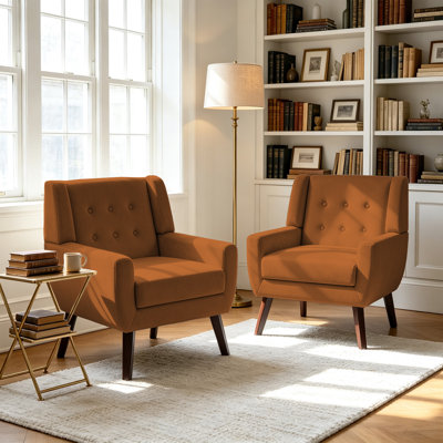 Fauteuil rembourré en velours orange avec dossier en bois massif Davey