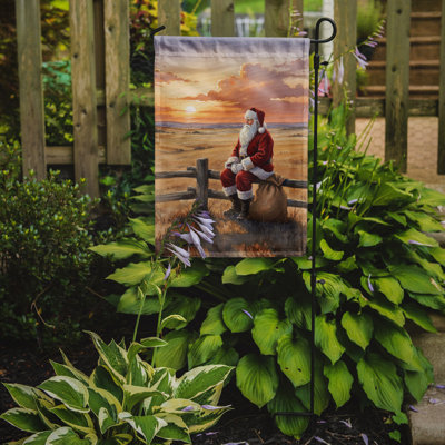 Santa Claus Watching the Sunset on the Prairie Christmas Garden Flag