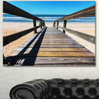 « long boardwalk into blue mer », reproduction de photo sur toile tendue