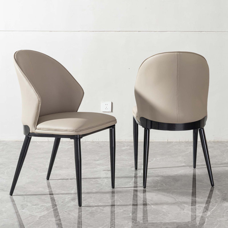 Chaise de salle à manger en polyuréthane avec dossier de conception unique, 2 pieds en métal