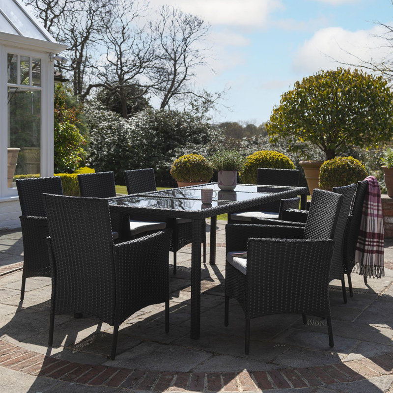 Ahmid 8 - Person Wicker Patio Dining Set with Rectangular Table , Cushions Included, Black, No
