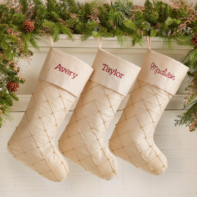 Chaussette de Noël élégamment brodée dorée