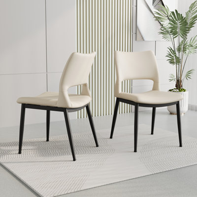 Ensemble de 2 chaises de salle à manger modernes et minimalistes en similicuir blanc, dossier confortable, support de pieds en métal, convenant aux restaurants, cuisines et bureaux.