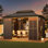 Pavillon de jardin de 10 pi x 12 pi, véranda entièrement fermée avec portes coulissantes verrouillables, pavillon de jardin à toit double en acier galvanisé, solarium de patio à cadre en aluminium pour la cour arrière