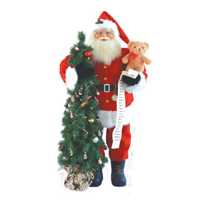 Figurine de père Noël avec ourson et arbre