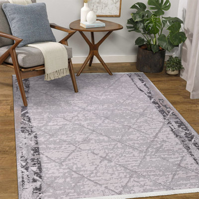 Tapis gris moderne lavable à la machine