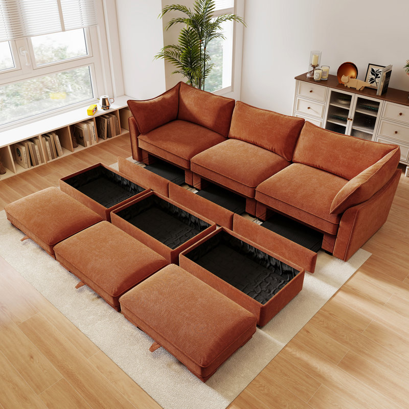 Chenille orange à 3 places avec repose-pieds, fonction de rangement modulaire, accoudoir en forme de croissant et, modulaire, tiroir sous chaque siège, ligne épurée