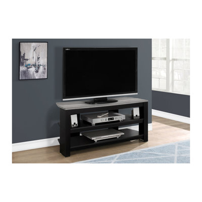 Meuble télé noir et gris avec piédestal central et tablettes ouvertes