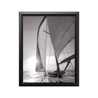Yacht Sailing Towards Sunset