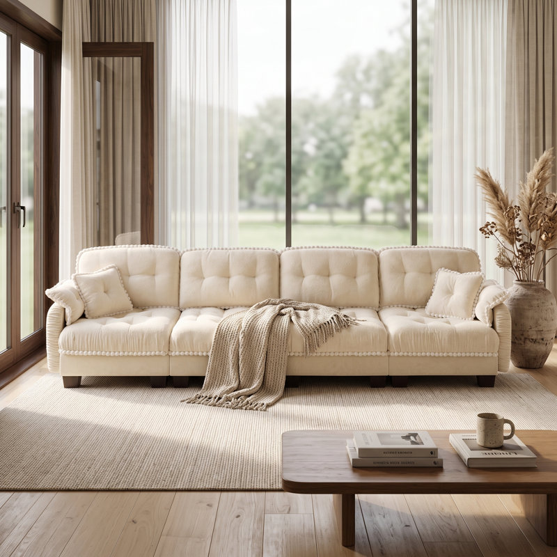 Canapé nuage 4 places beige crème en chenille, avec coussins capitonnés et finitions à pompons., 4 Seat