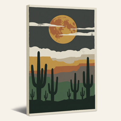 Tableau sur toile représentant une lune orange au-dessus de cactus saguaro dans le désert