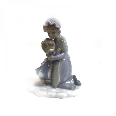 Grandmother And Child Hugging Figurine