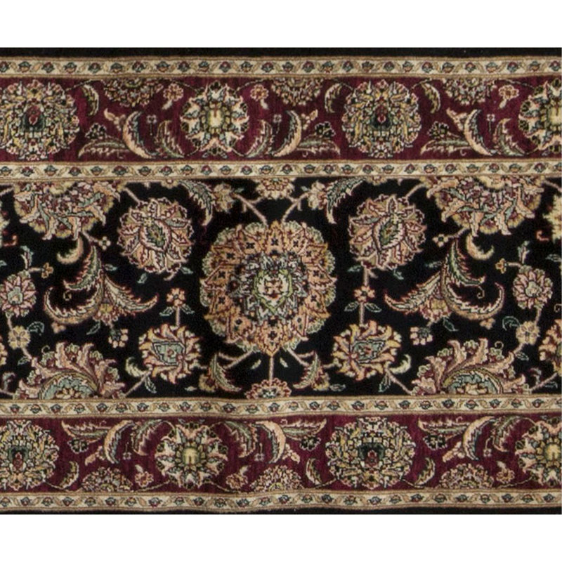 Manchuria Wool Oriental Area Rug in Black/Wine