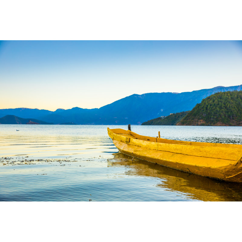 Wooden Boat In Lugu Lake by Xijian - Wrapped Canvas Print, 51cm H x 76cm W x 3.8cm D