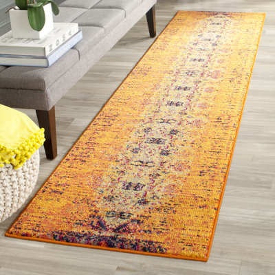 Hertzler Oriental Orange / Multi Area Rug