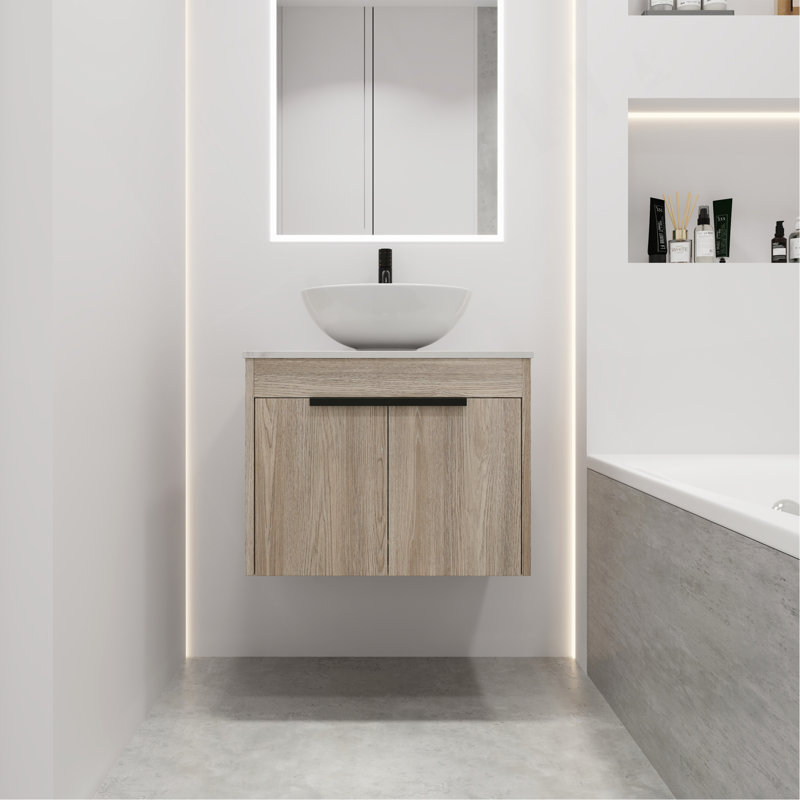 Meuble-lavabo moderne avec lavabo en céramique et porte à fermeture en douceur, fixé au mur pour un look élégant.