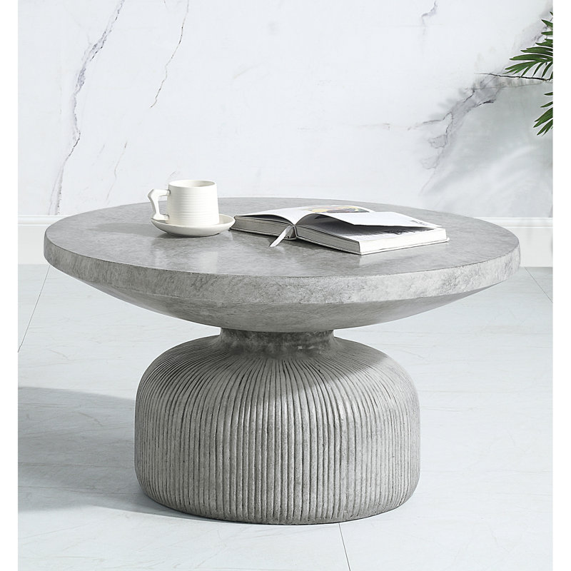 Table basse Creative Cement avec couvercle rond gris vieilli et plateau de table confortable