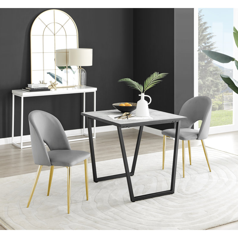 Table de salle à manger et chaises en mélamine effet marbre Carzon - Chaises de salle à manger en similicuir de luxe