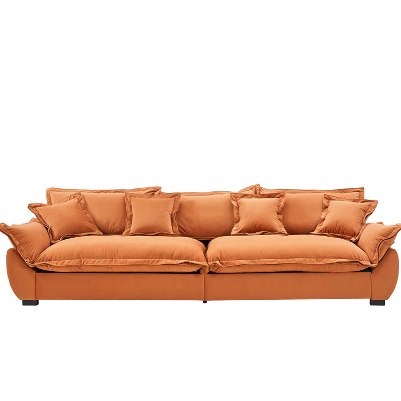 Canapé modulaire orange avec des housses lavables, une structure en bois massif et des coussins décoratifs pour appartement